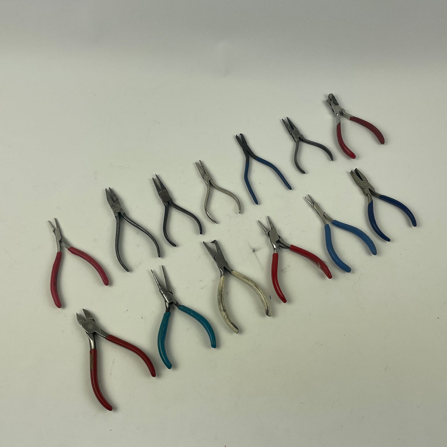May Lot 60- Watchmaker’s Selection of Thirteen Pairs of Bench Pliers