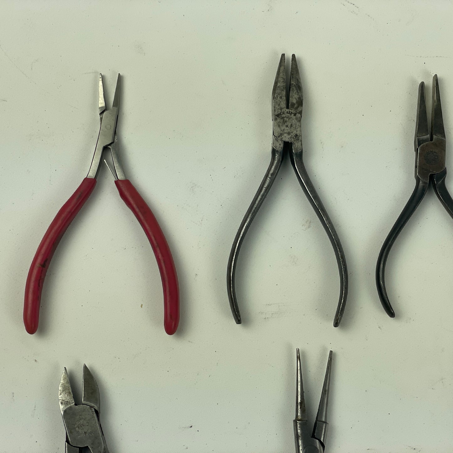May Lot 60- Watchmaker’s Selection of Thirteen Pairs of Bench Pliers