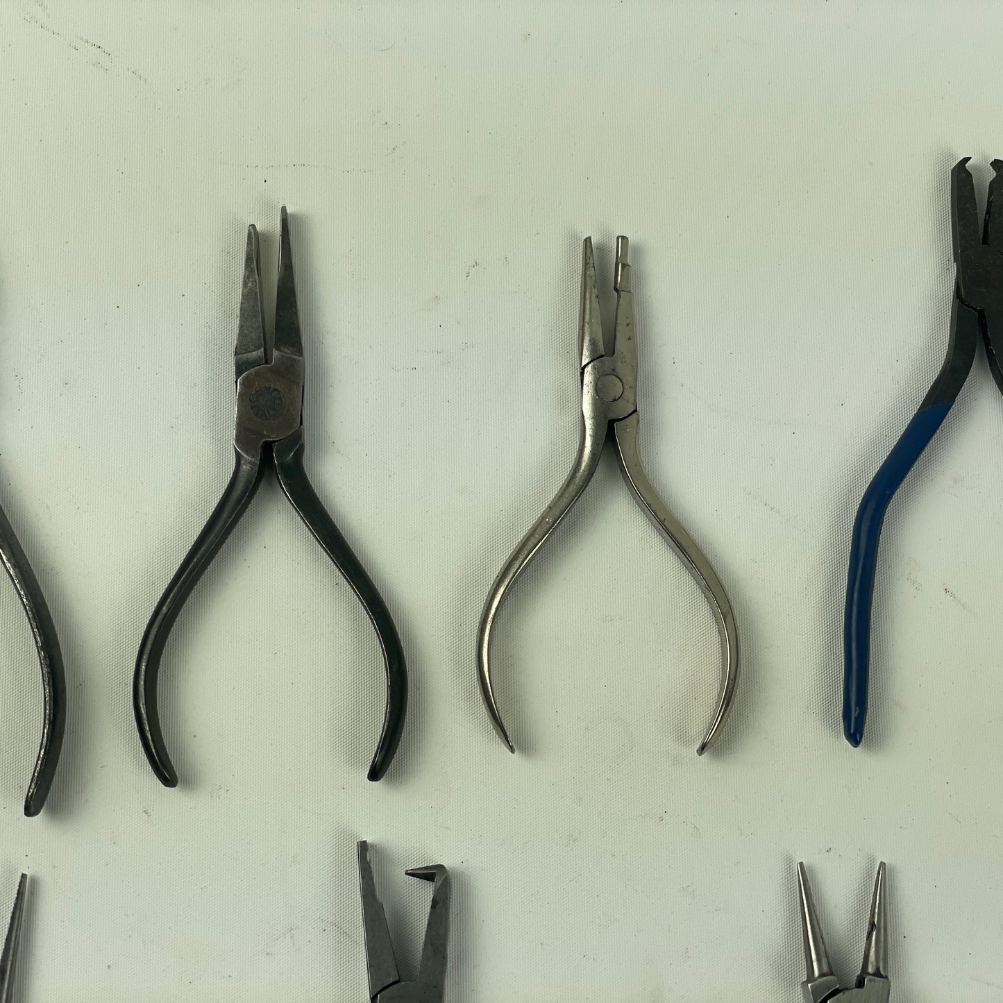 May Lot 60- Watchmaker’s Selection of Thirteen Pairs of Bench Pliers