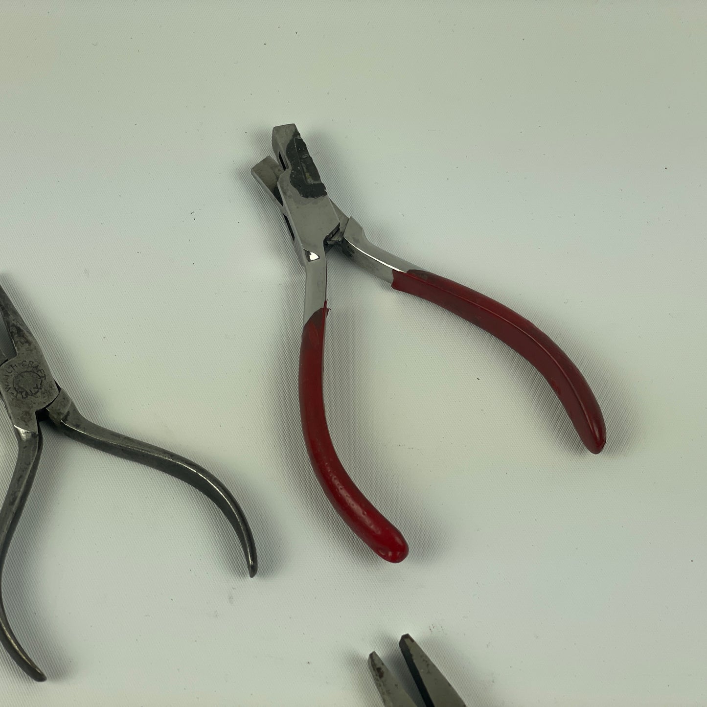 May Lot 60- Watchmaker’s Selection of Thirteen Pairs of Bench Pliers