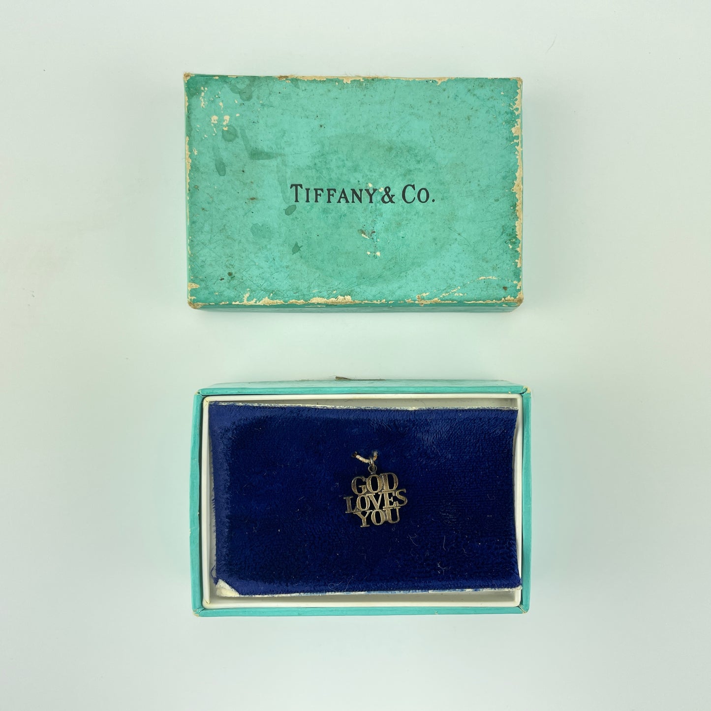 Lot 57- Vintage Tiffany & Co. “God Loves You” Pendant