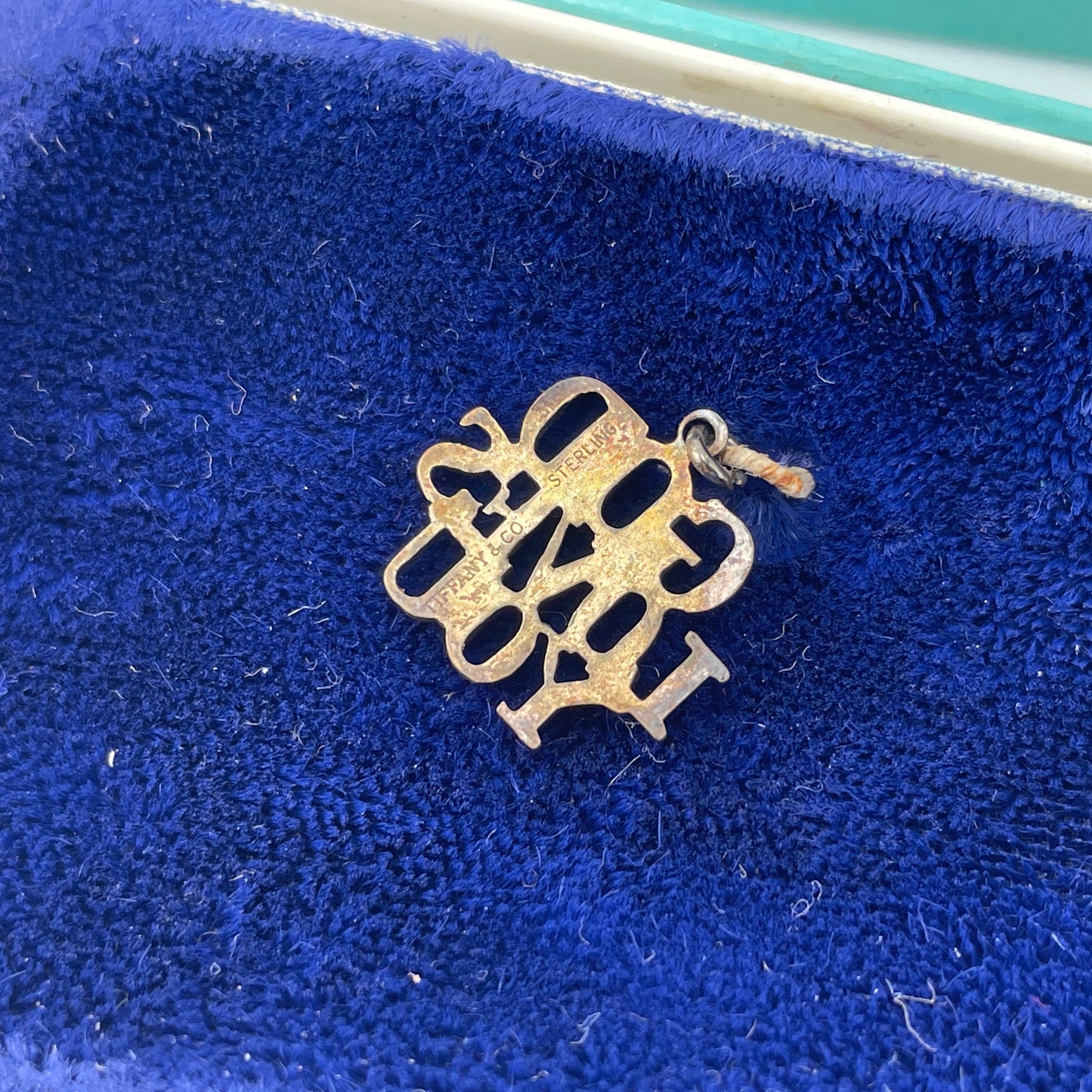 Lot 57- Vintage Tiffany & Co. “God Loves You” Pendant