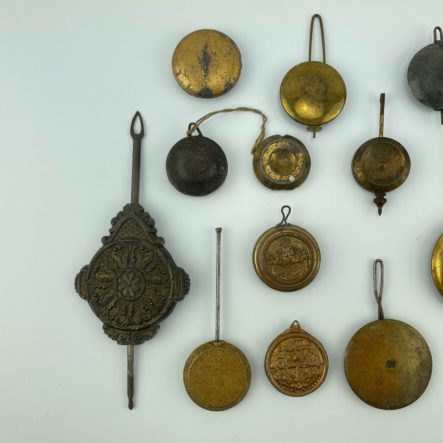 Lot 81- Clock Pendulum Assortment of 18