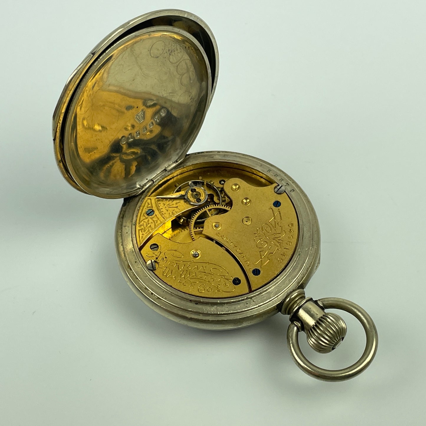 Lot 29- Waltham & Waterbury Lapel Pocket Watches