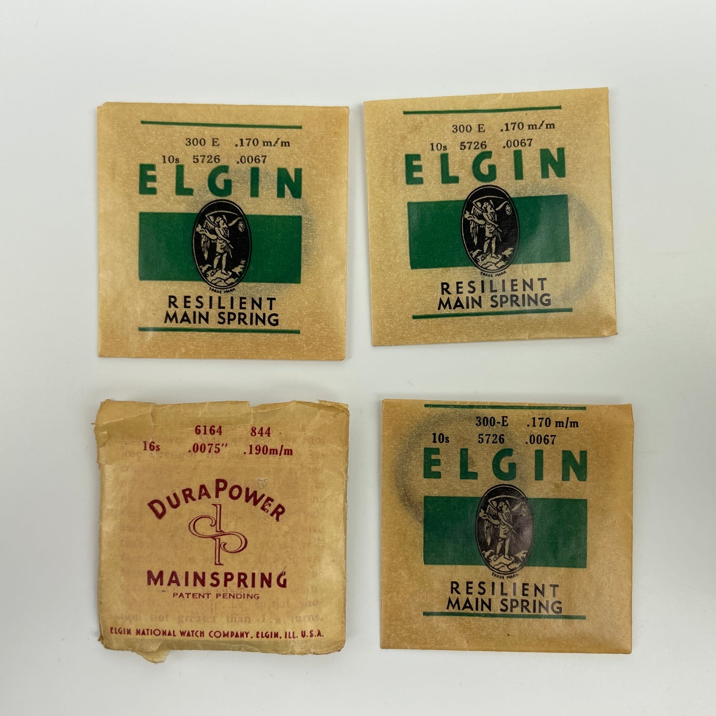 Lot 50- Elgin O, 10, 12 & 16 Size Blued & White Alloy PW Mainsprings