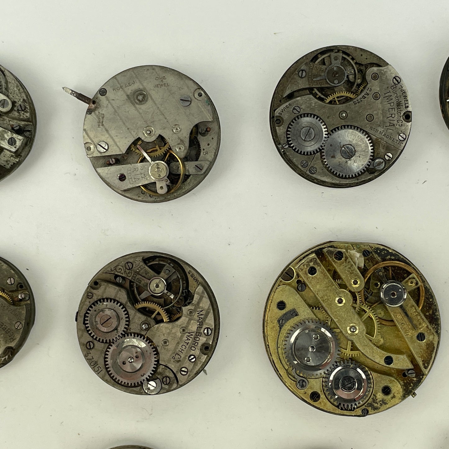 Lot 105- Swiss Lapel Watch Movements (16)