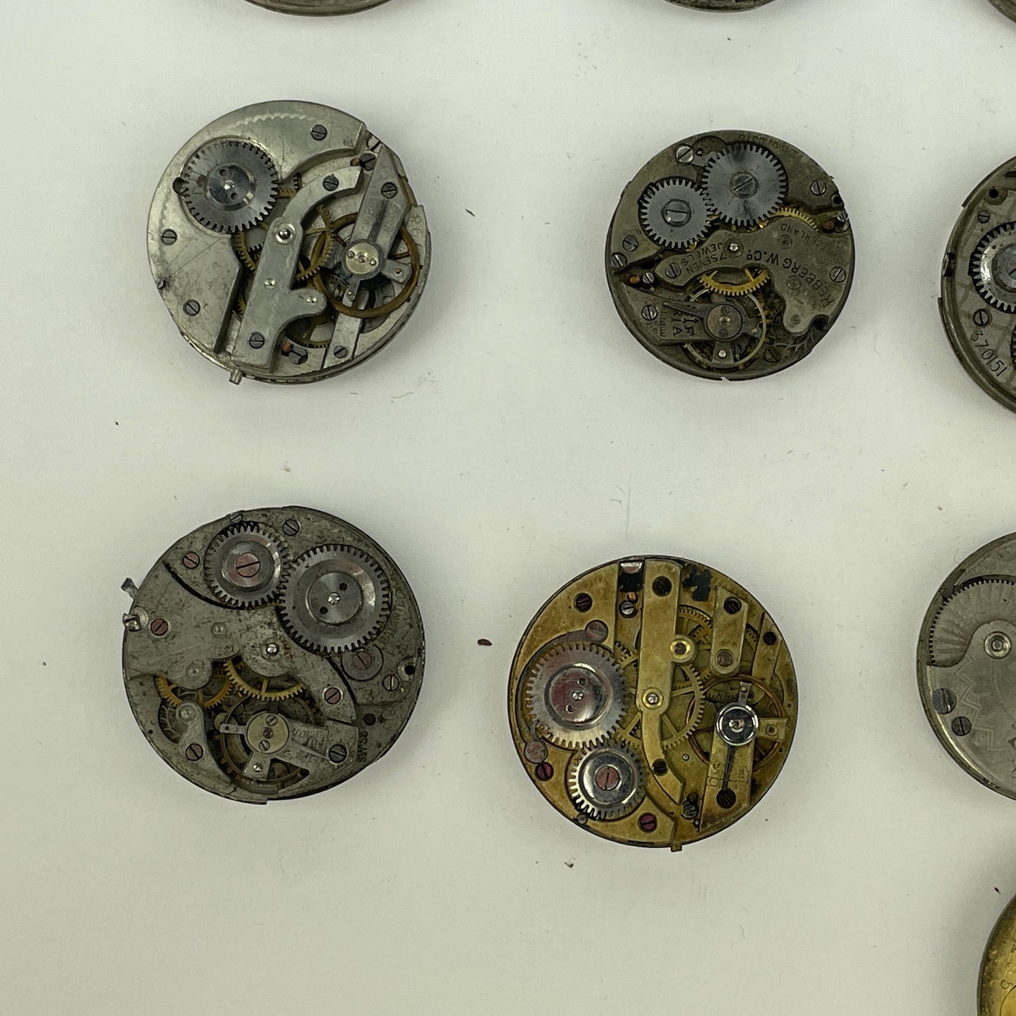 Lot 105- Swiss Lapel Watch Movements (16)