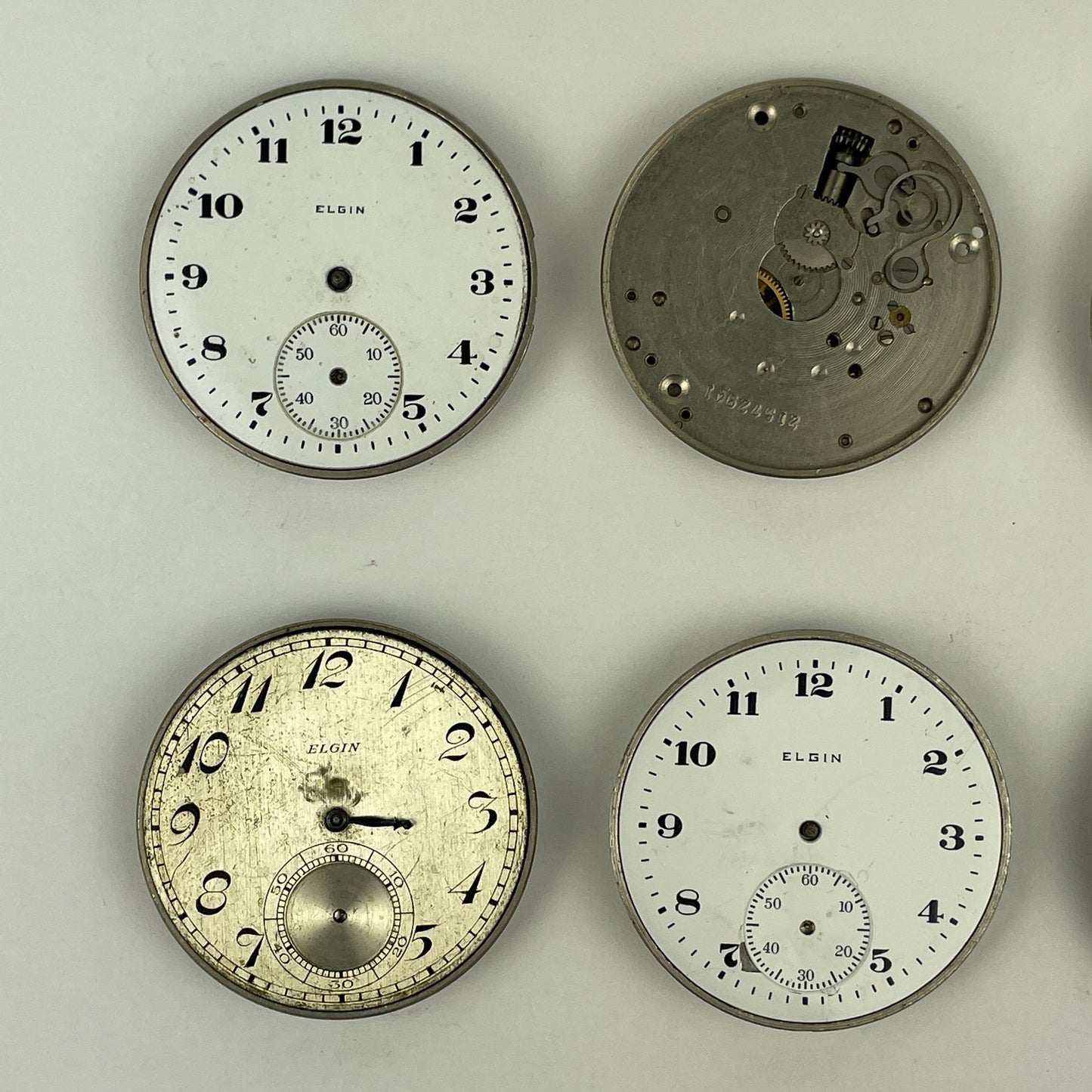Lot 54- Elgin 12 Size Pocket Watch Movements (8)