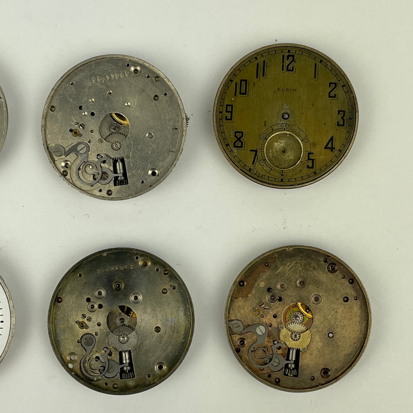Lot 54- Elgin 12 Size Pocket Watch Movements (8)