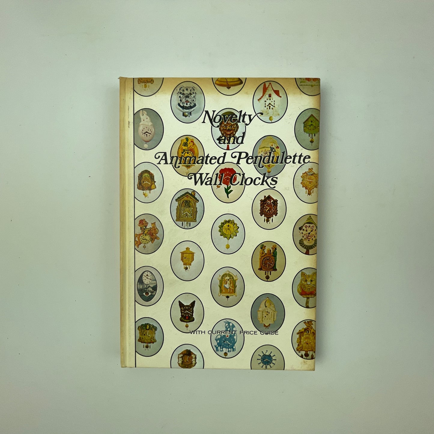 Oct Lot 93- Novelty and Animated Pendulette Wall Clocks | Book
