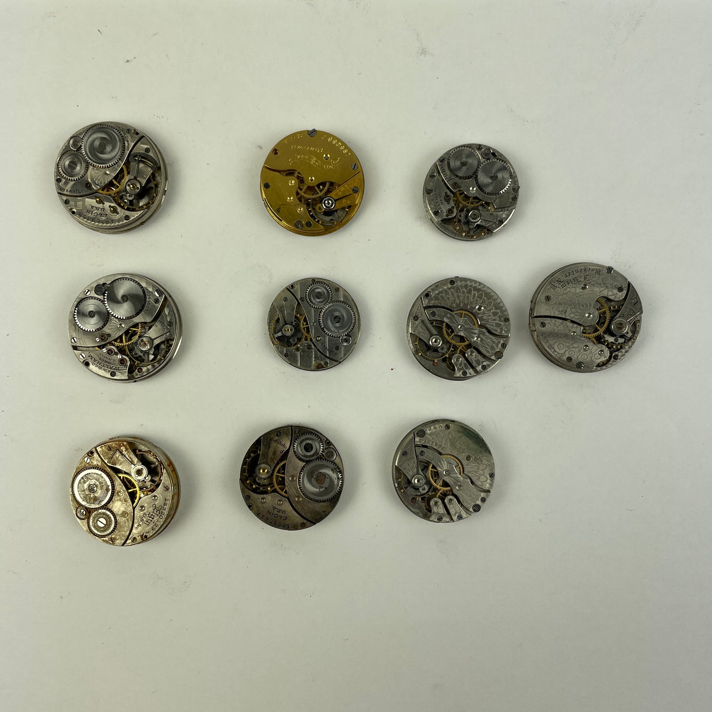 Oct Lot 15- American Lapel Watch Movements