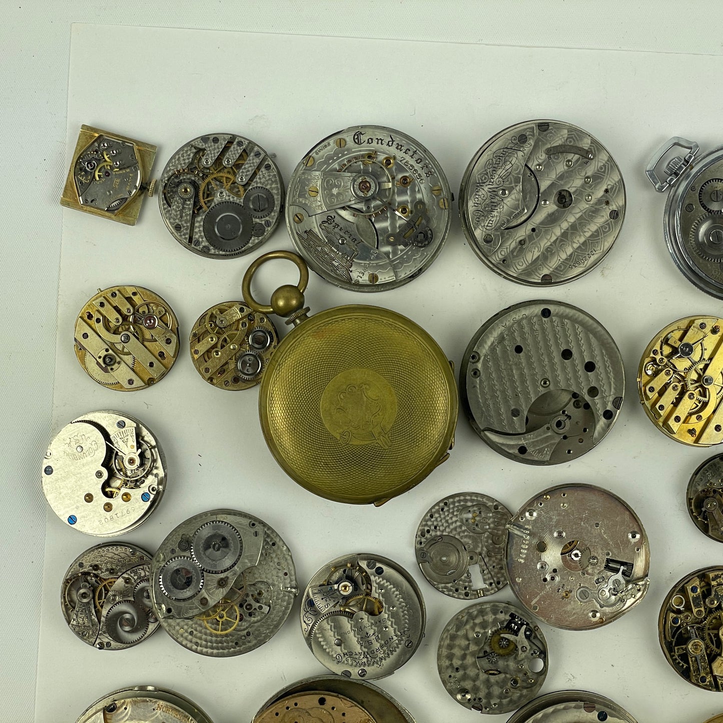 Oct Lot 38- American & Swiss Assortment Pocket Watch Movements