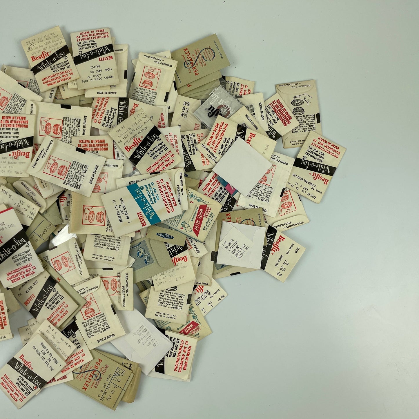 Nov Lot 39- Huge Lot of White Mainsprings