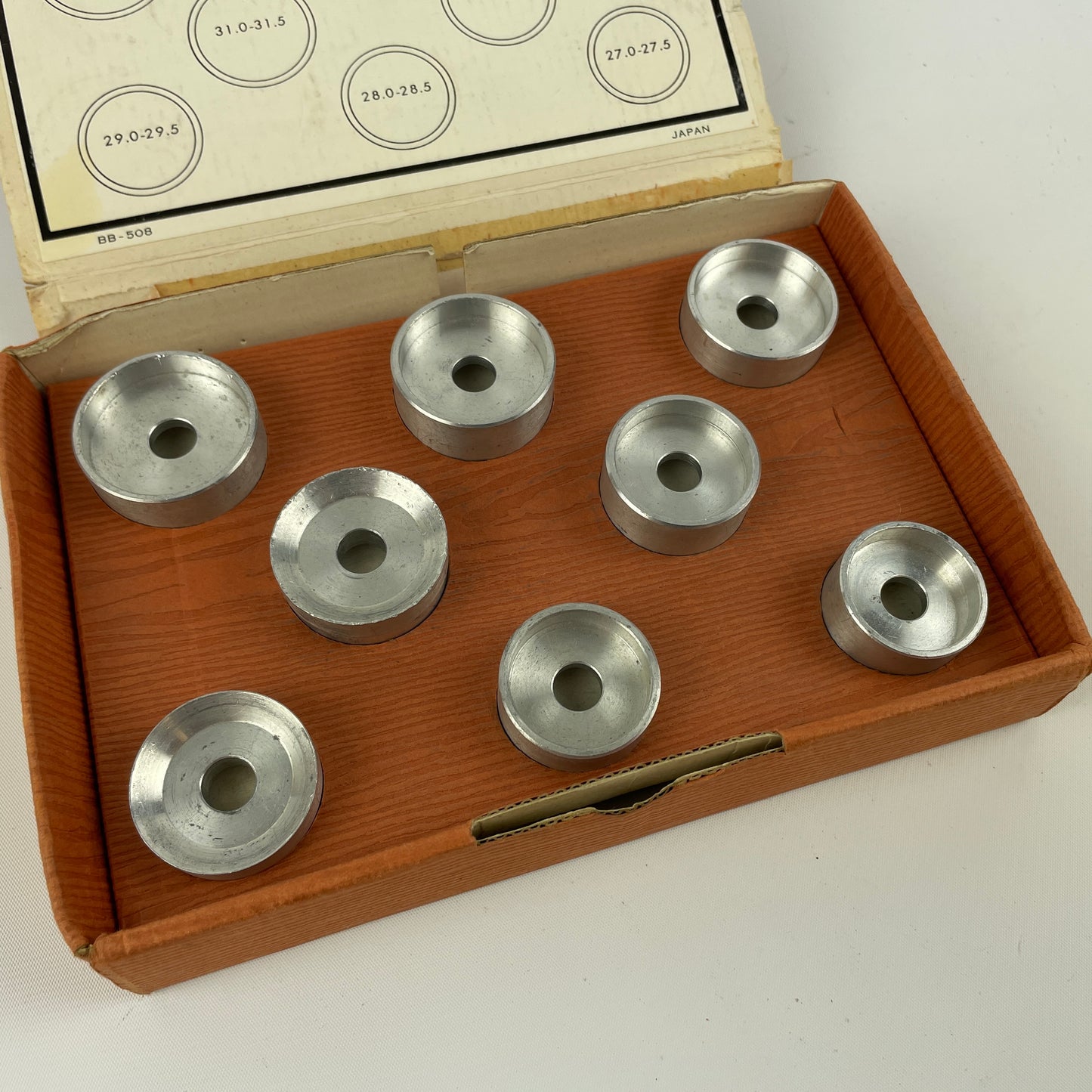 Jan Lot 52- Watchmaker’s Bench top Crystal Machine with Two Boxes of Metal Dies