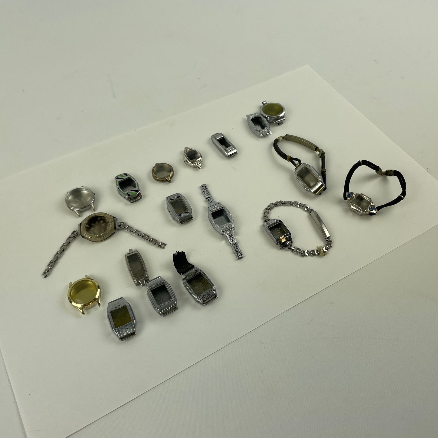 Jan Lot 65- Eighteen Ladie's Vintage Fancy Metal & White RGP Wristwatch Cases