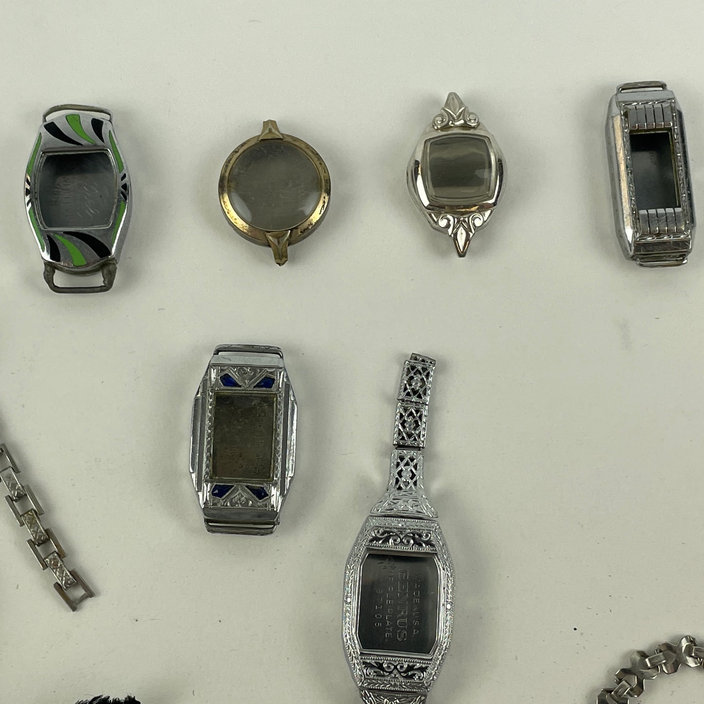 Jan Lot 65- Eighteen Ladie's Vintage Fancy Metal & White RGP Wristwatch Cases