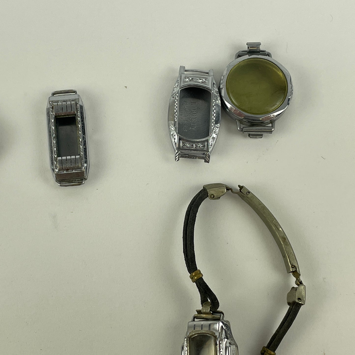Jan Lot 65- Eighteen Ladie's Vintage Fancy Metal & White RGP Wristwatch Cases