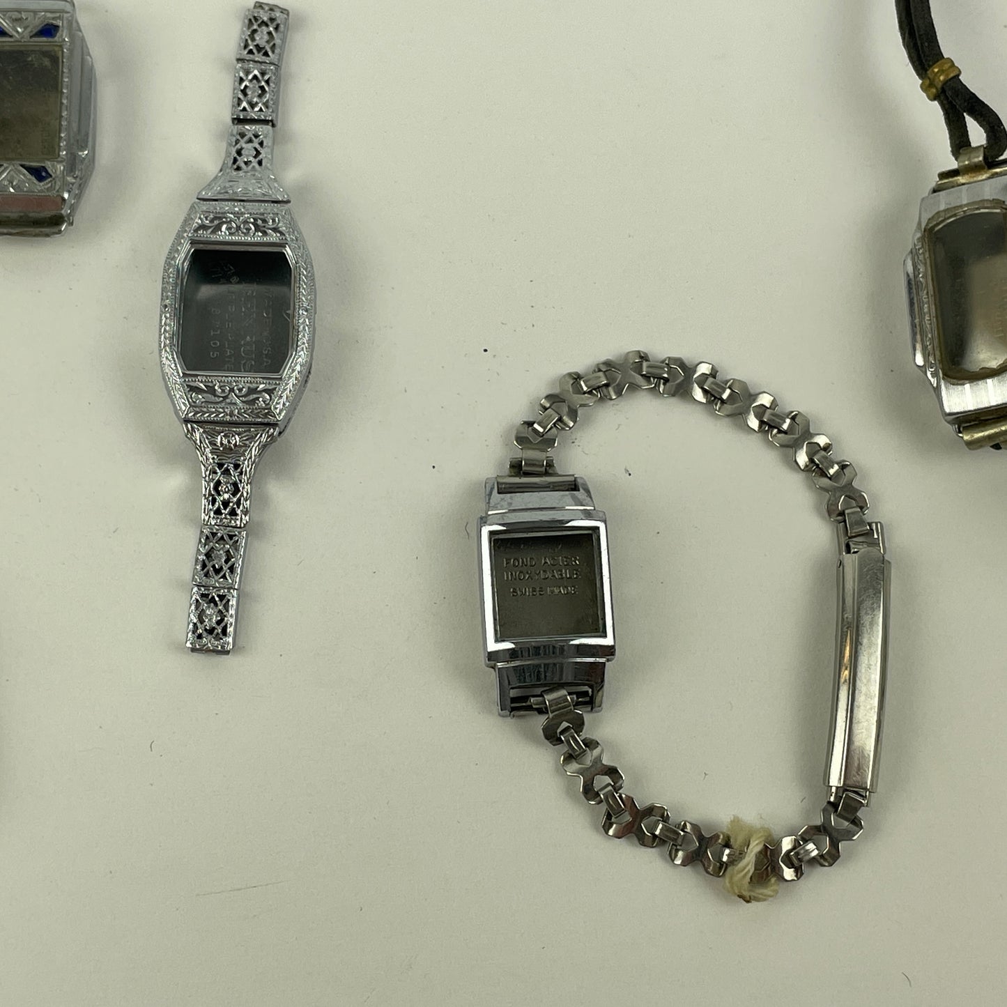 Jan Lot 65- Eighteen Ladie's Vintage Fancy Metal & White RGP Wristwatch Cases