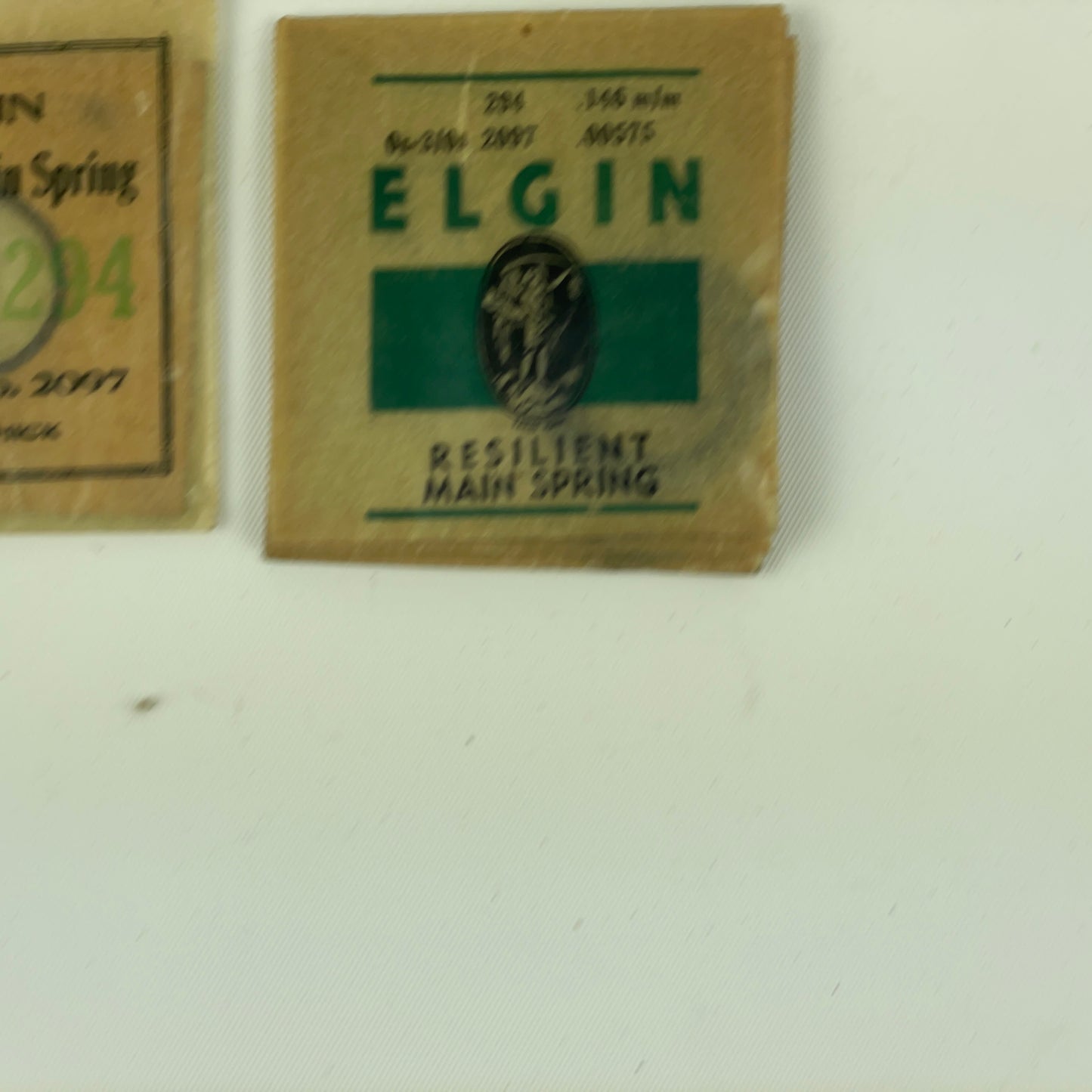 Jan Lot 79- Elgin O Size & 12 Size Blued Factory Packaged Mainsprings
