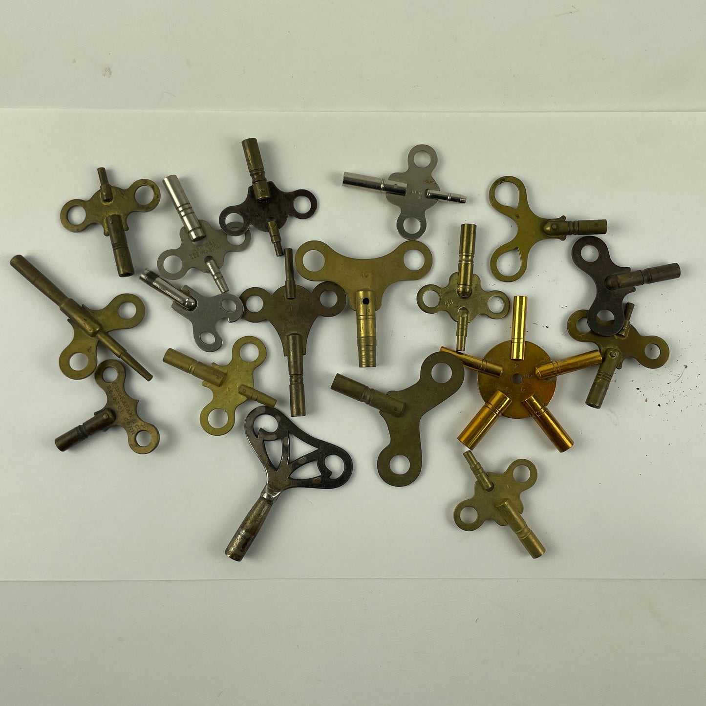 Lot 49- Clock Winding Keys (18)