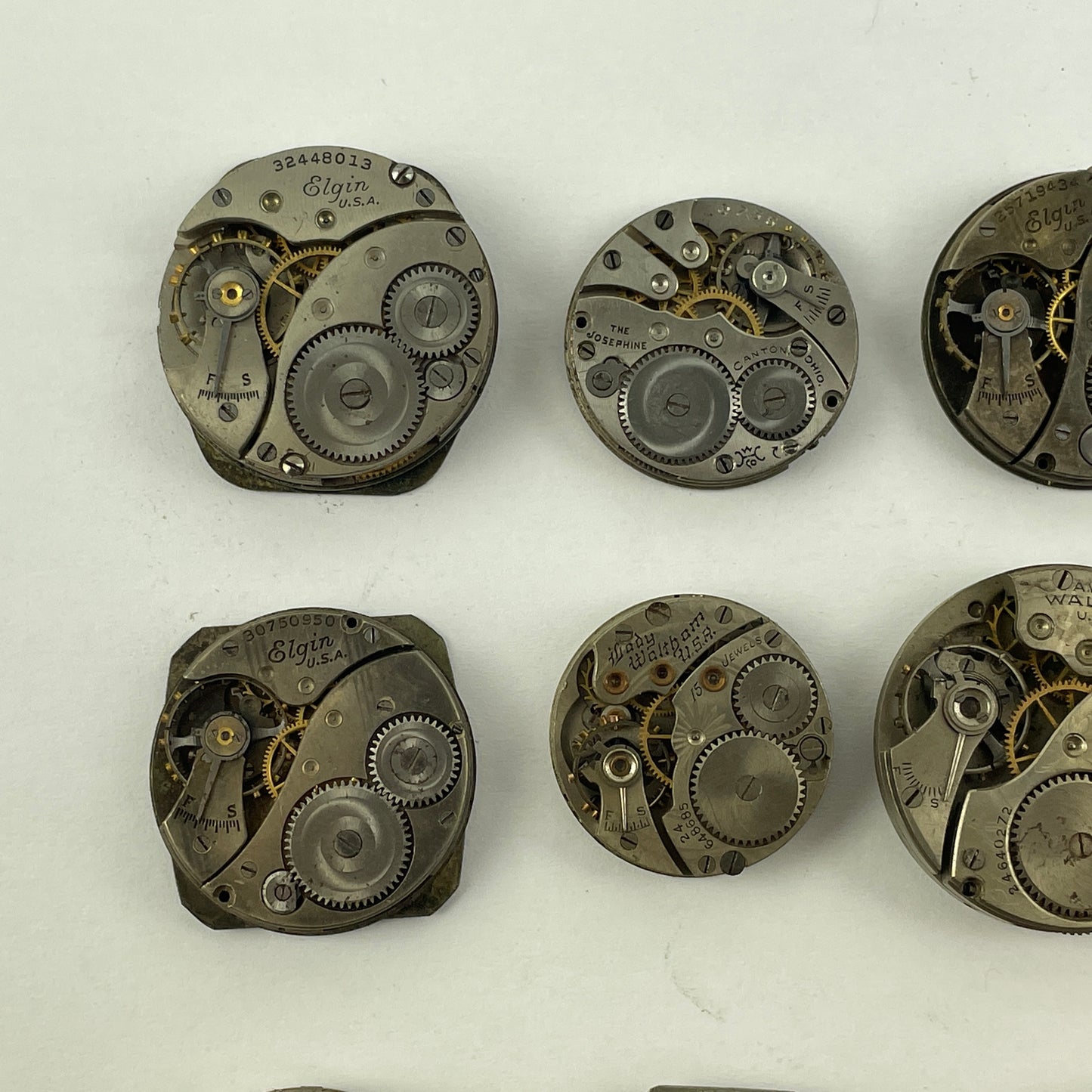 Lot 131- Waltham & Elgin Lapel & Wristwatch Movements