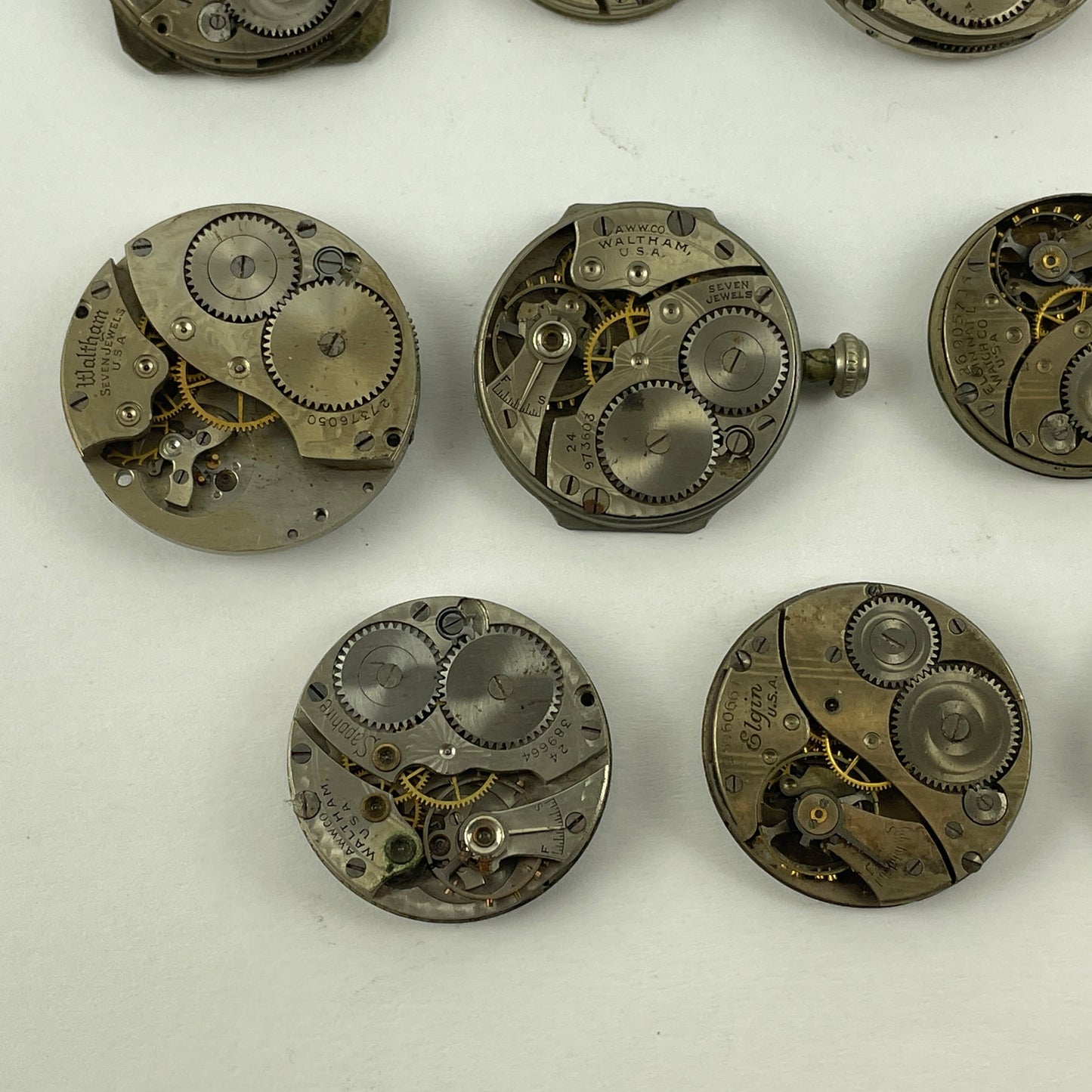 Lot 131- Waltham & Elgin Lapel & Wristwatch Movements
