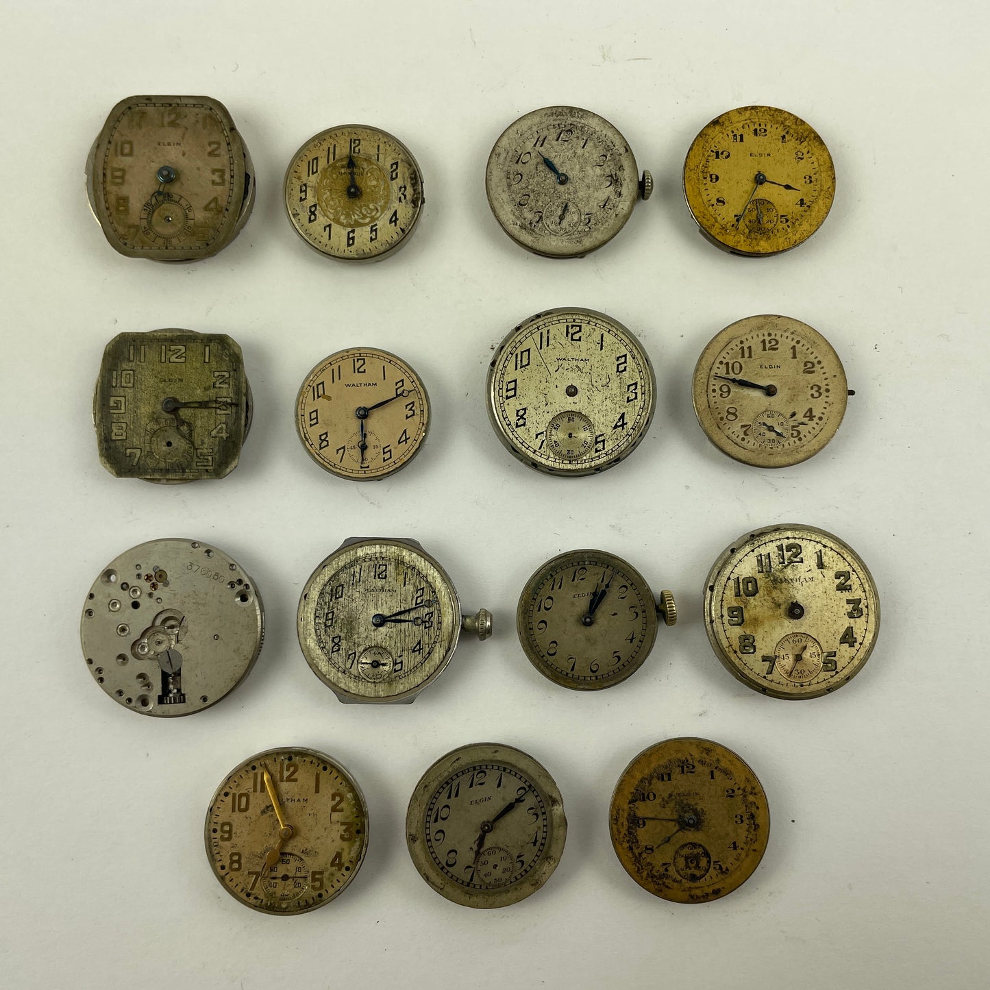 Lot 131- Waltham & Elgin Lapel & Wristwatch Movements