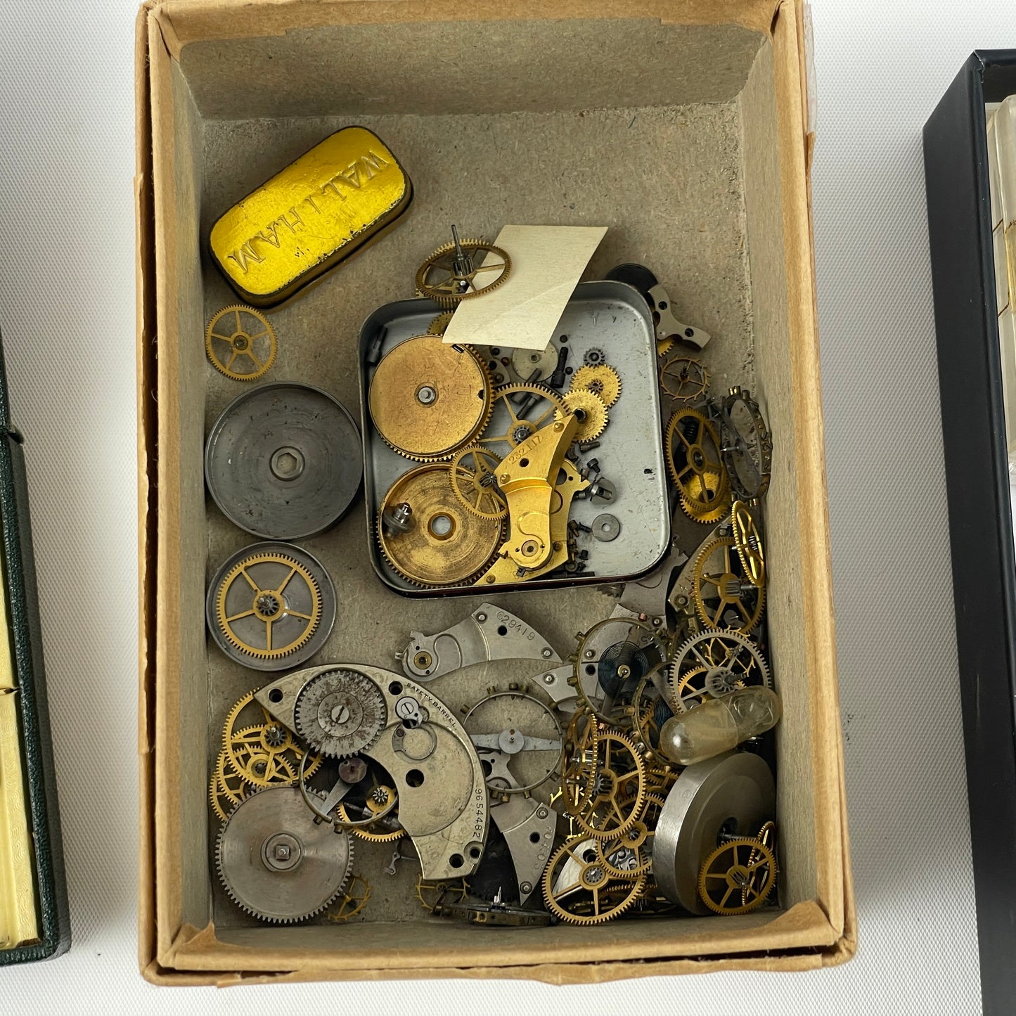 Lot 52- Assortment of Pocket Watch Movements, Wristwatch Stems, Crowns, etc.
