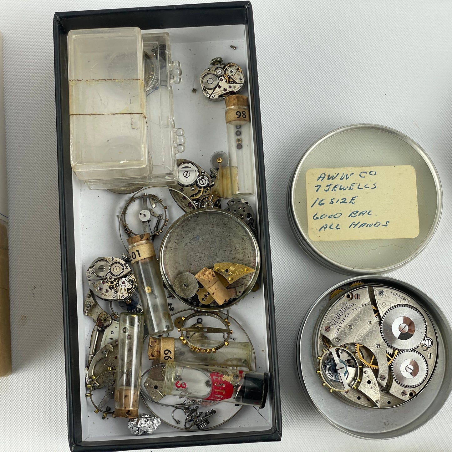 Lot 52- Assortment of Pocket Watch Movements, Wristwatch Stems, Crowns, etc.