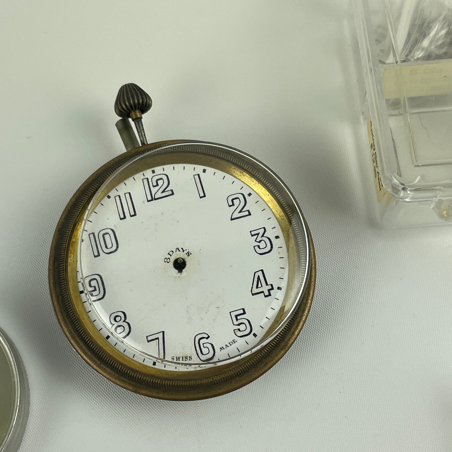 Lot 52- Assortment of Pocket Watch Movements, Wristwatch Stems, Crowns, etc.