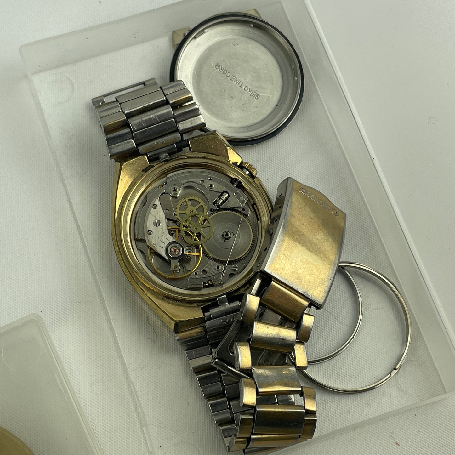 Lot 52- Assortment of Pocket Watch Movements, Wristwatch Stems, Crowns, etc.