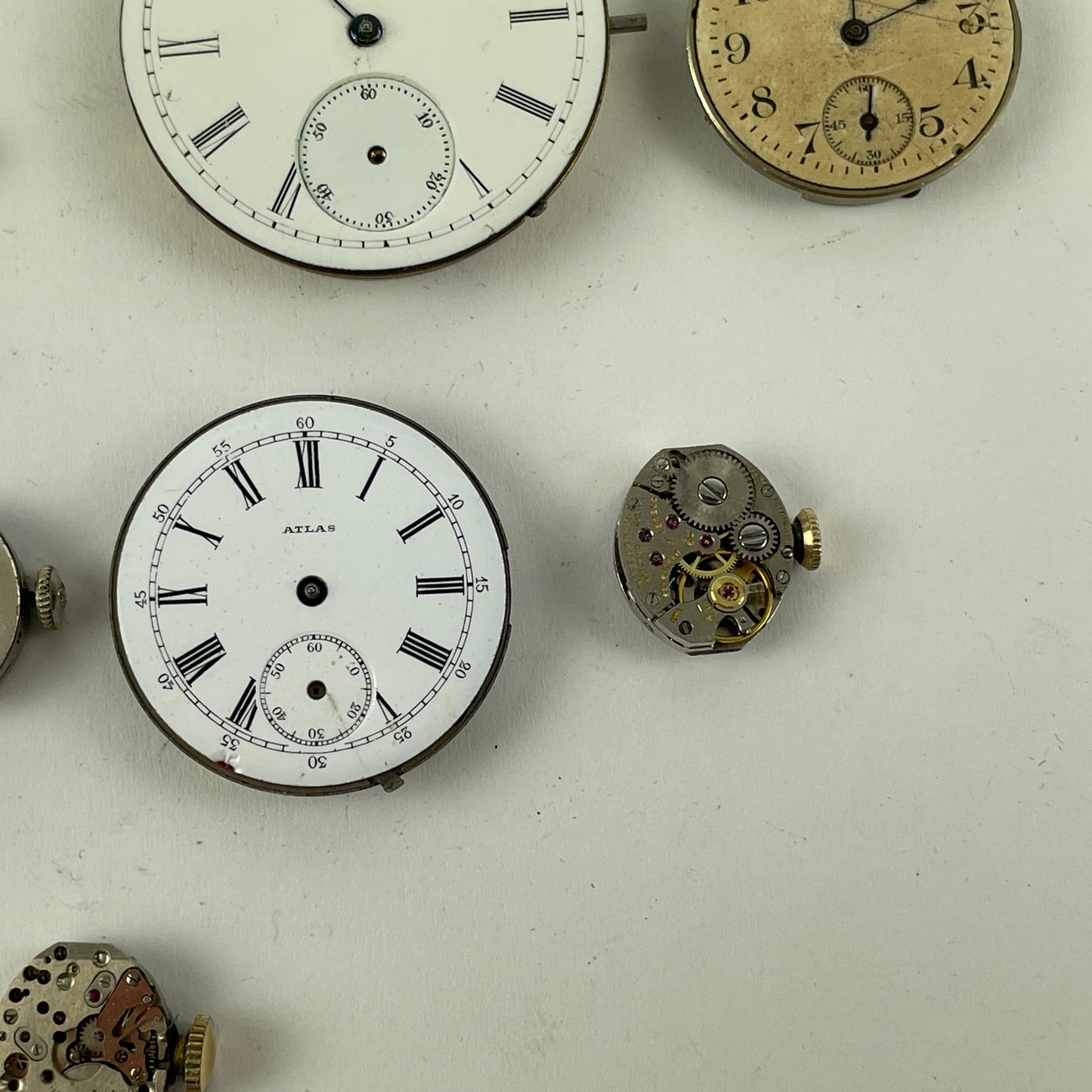 Feb Lot 32- Swiss, Waltham & Elgin Lapel & Wristwatch Movements
