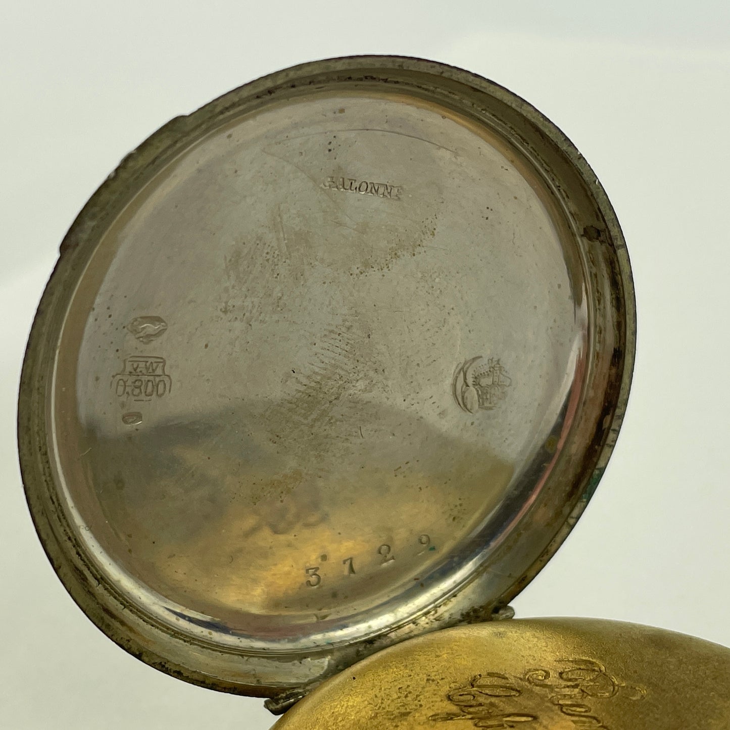 Feb Lot 79- Swiss Coin Silver w/ gold bezels Pocket Watch