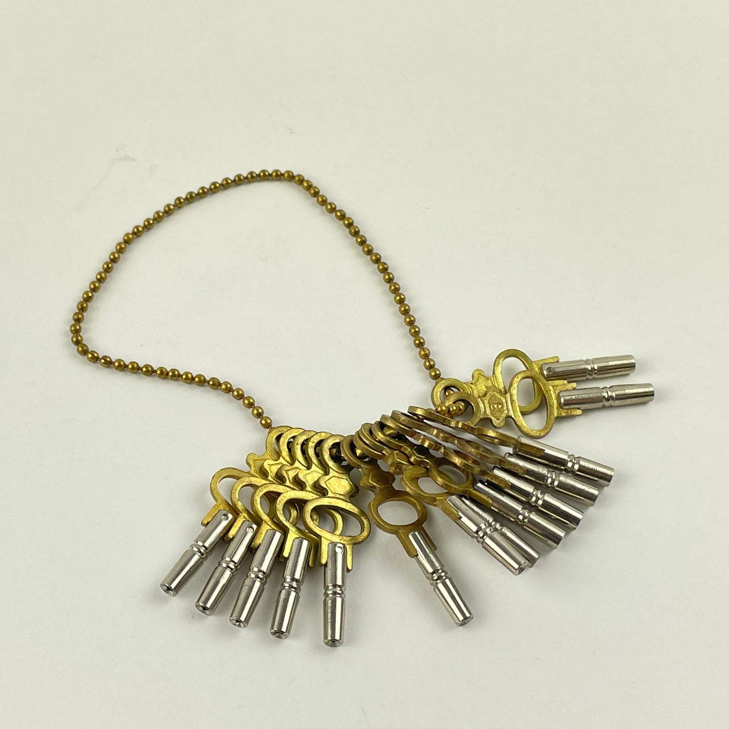 Feb Lot 115- Swiss Modern Pocket Watch Keys Set of (14)