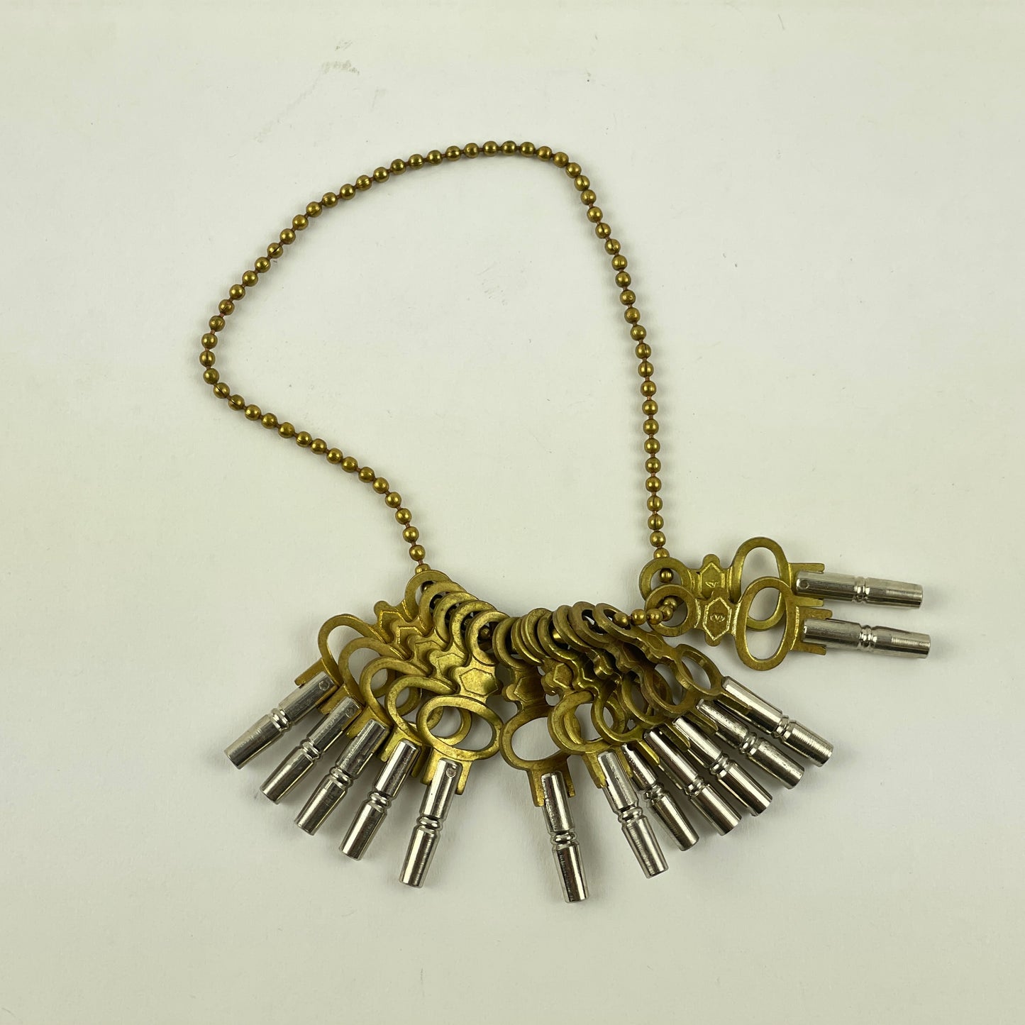 Feb Lot 115- Swiss Modern Pocket Watch Keys Set of (14)