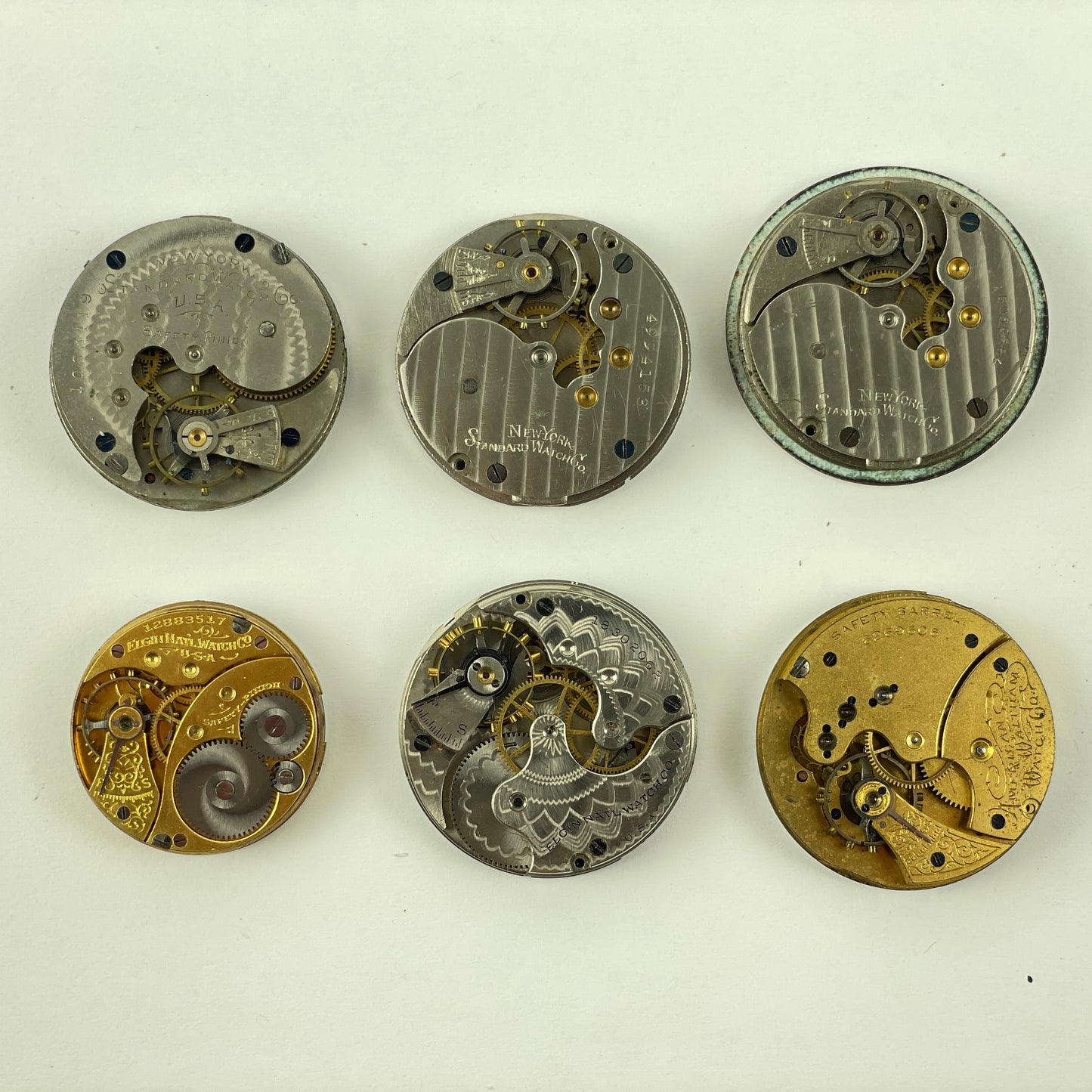 Lot 84- Elgin | Waltham | New York Standard Pocket Watch Movement Assortment