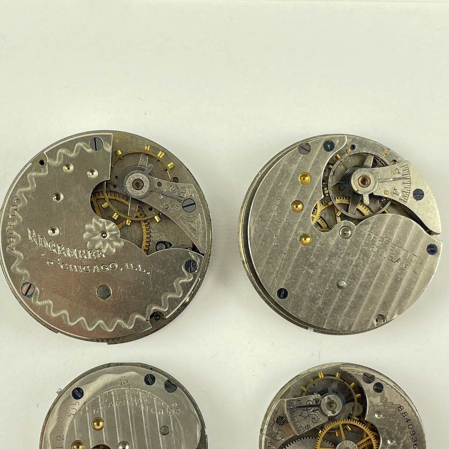 Lot 27- Elgin | Hampden | Waltham Pocket Watch Movement Assortment