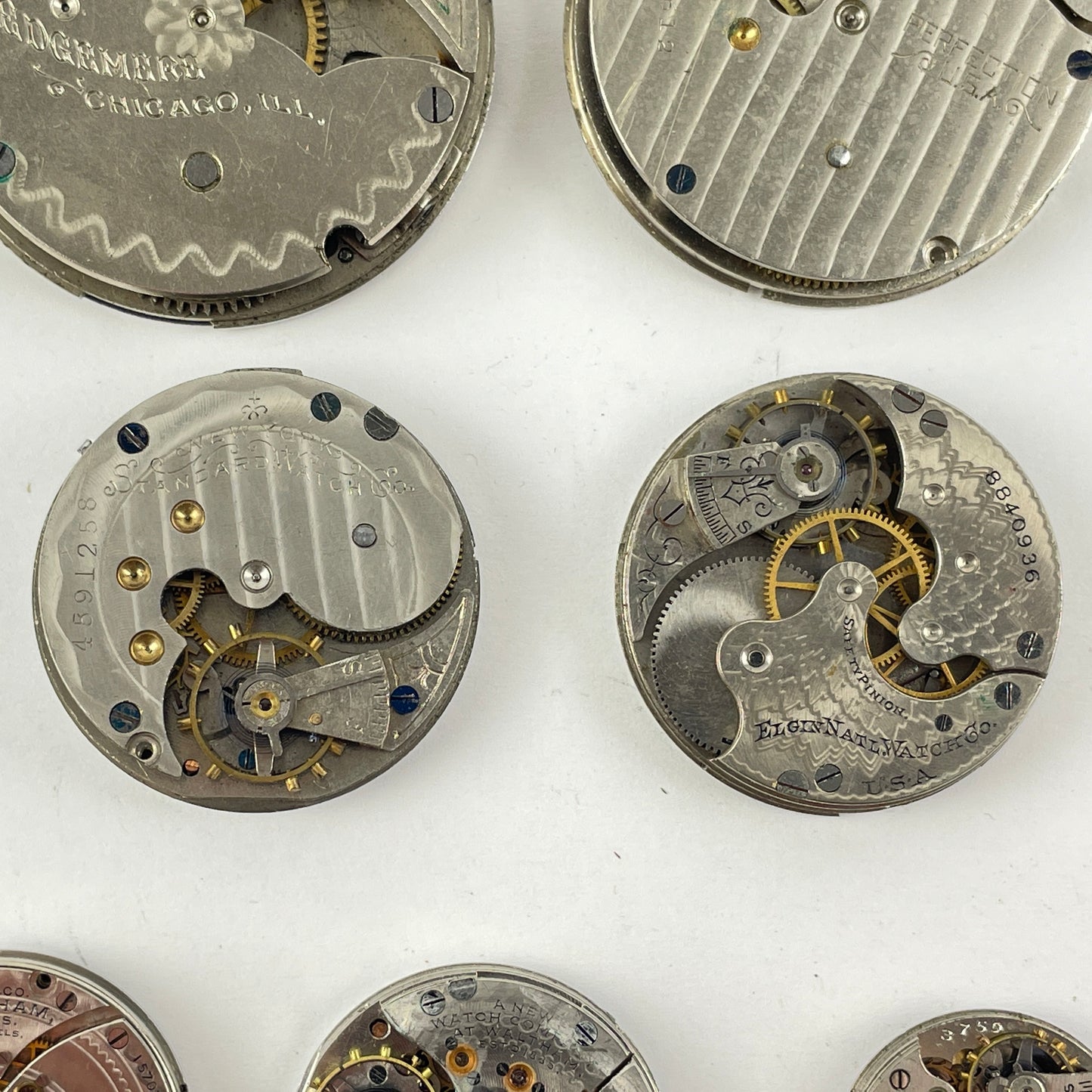 Lot 27- Elgin | Hampden | Waltham Pocket Watch Movement Assortment