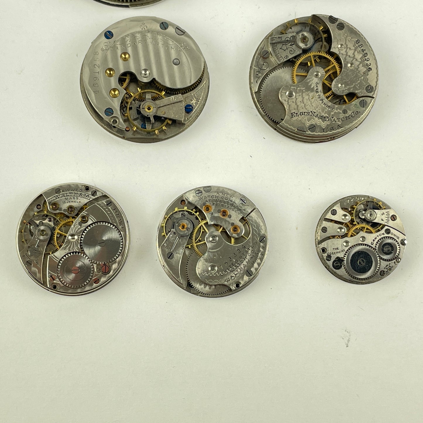 Lot 27- Elgin | Hampden | Waltham Pocket Watch Movement Assortment