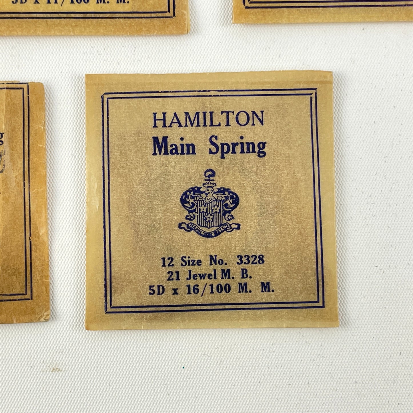 Lot 105- Genuine NOS Hamilton Factory 6/0 & 12 Size Mainsprings