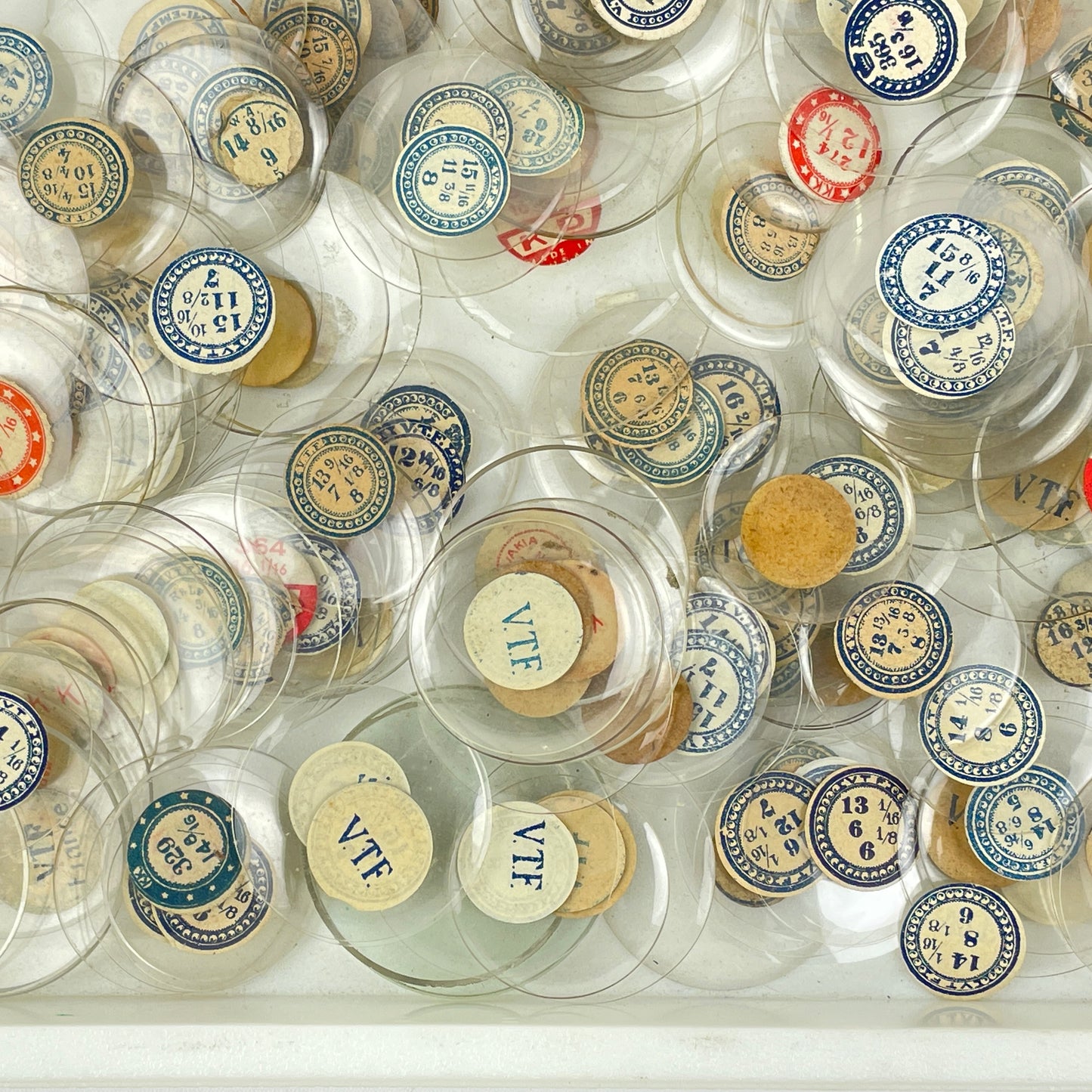 Lot 108- Watchmaker’s Selection of 300 Glass NOS Pocket Watch Crystals