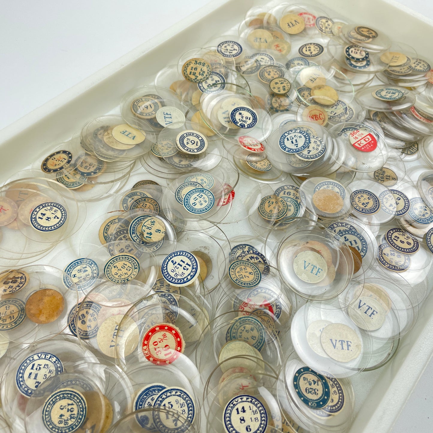 Lot 108- Watchmaker’s Selection of 300 Glass NOS Pocket Watch Crystals