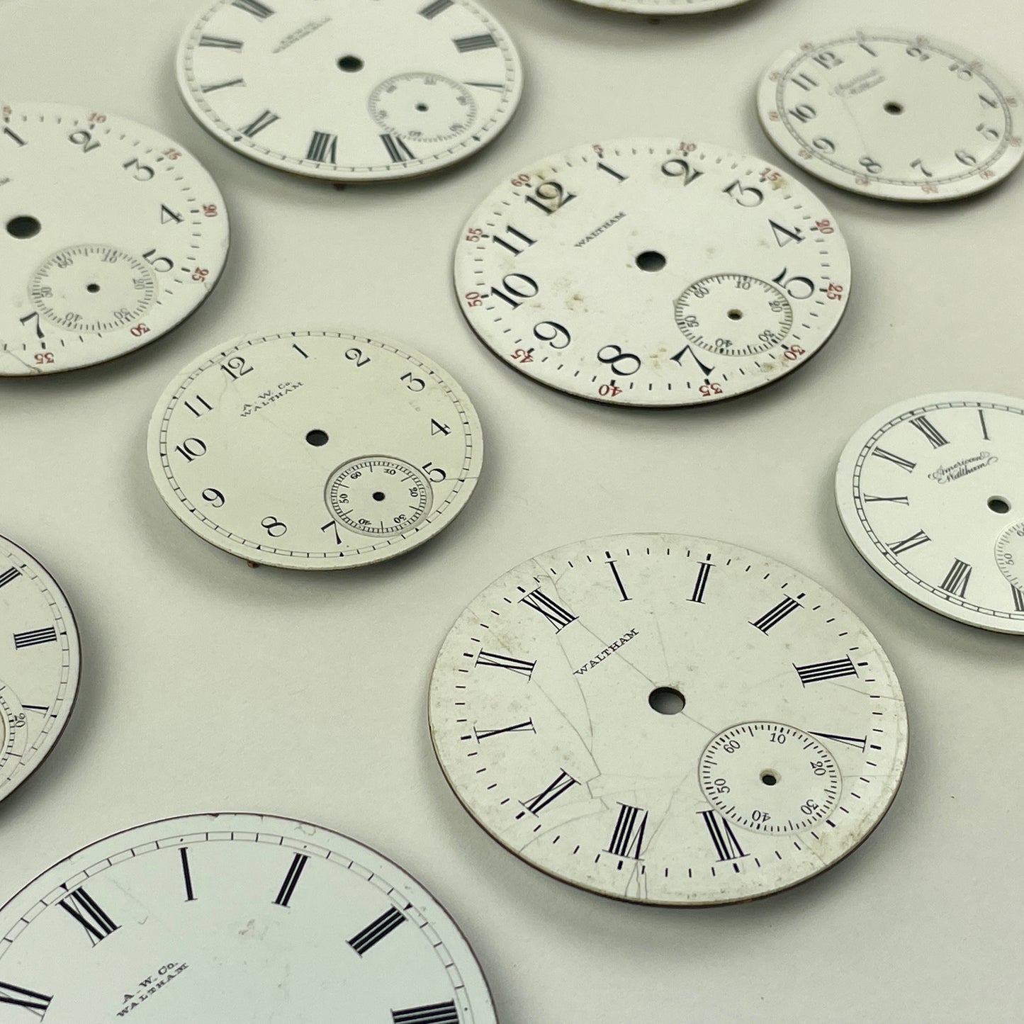 Apr Lot 26- Waltham Assortment of 12 Enamel Pocket Watch Dials