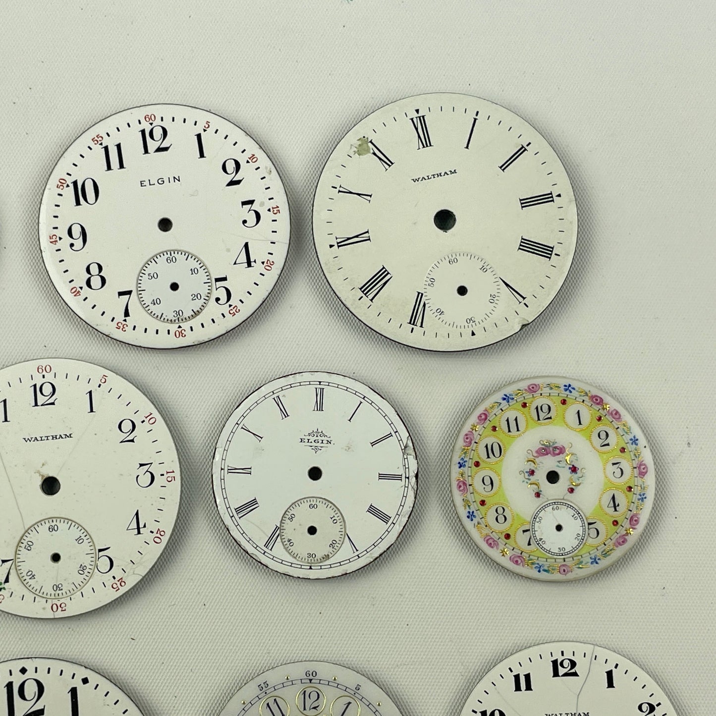 Apr Lot 113- Assortment of American & Swiss Lapel Watch to 18 Size Pocket Watch Dials