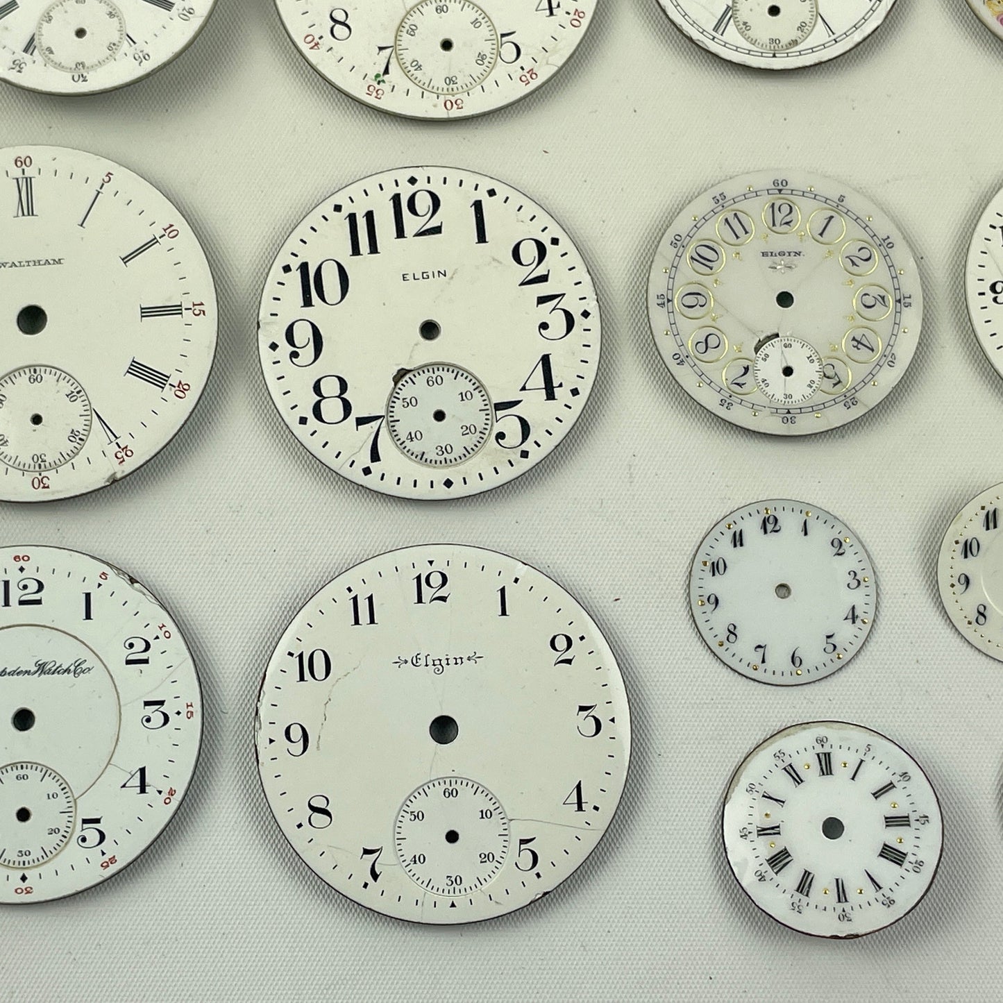 Apr Lot 113- Assortment of American & Swiss Lapel Watch to 18 Size Pocket Watch Dials