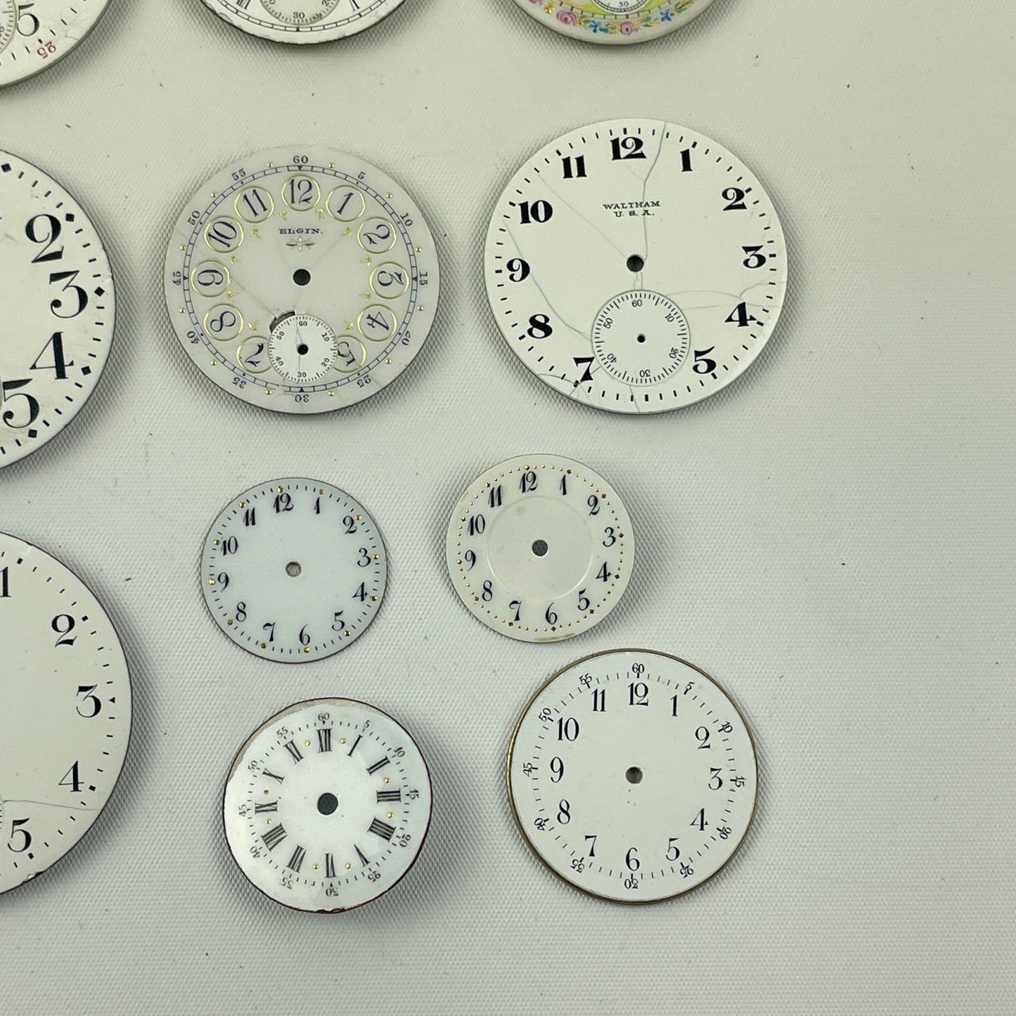 Apr Lot 113- Assortment of American & Swiss Lapel Watch to 18 Size Pocket Watch Dials