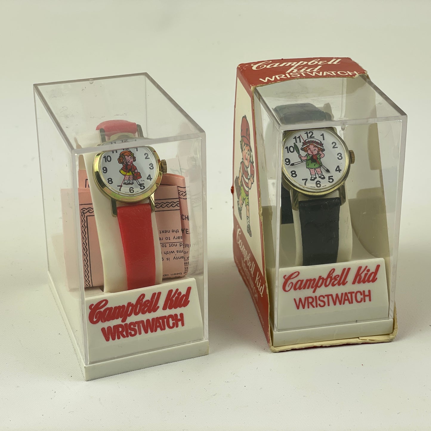 Apr Lot 58- Campbell Kid Pair of NOS Wristwatches