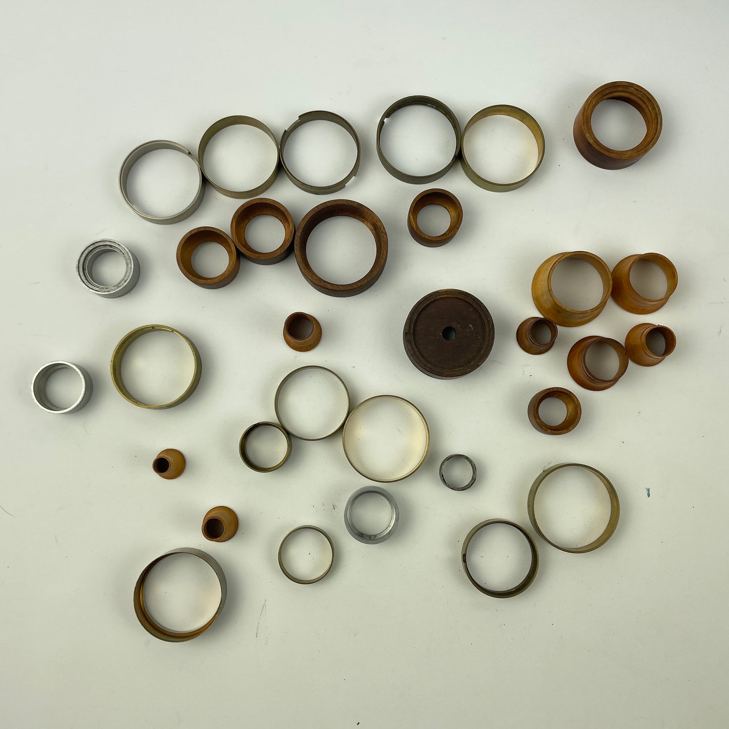 Apr Lot 38- Watchmaker’s Wood, Brass & Aluminum Lapel to Pocket Watch Movement Holders