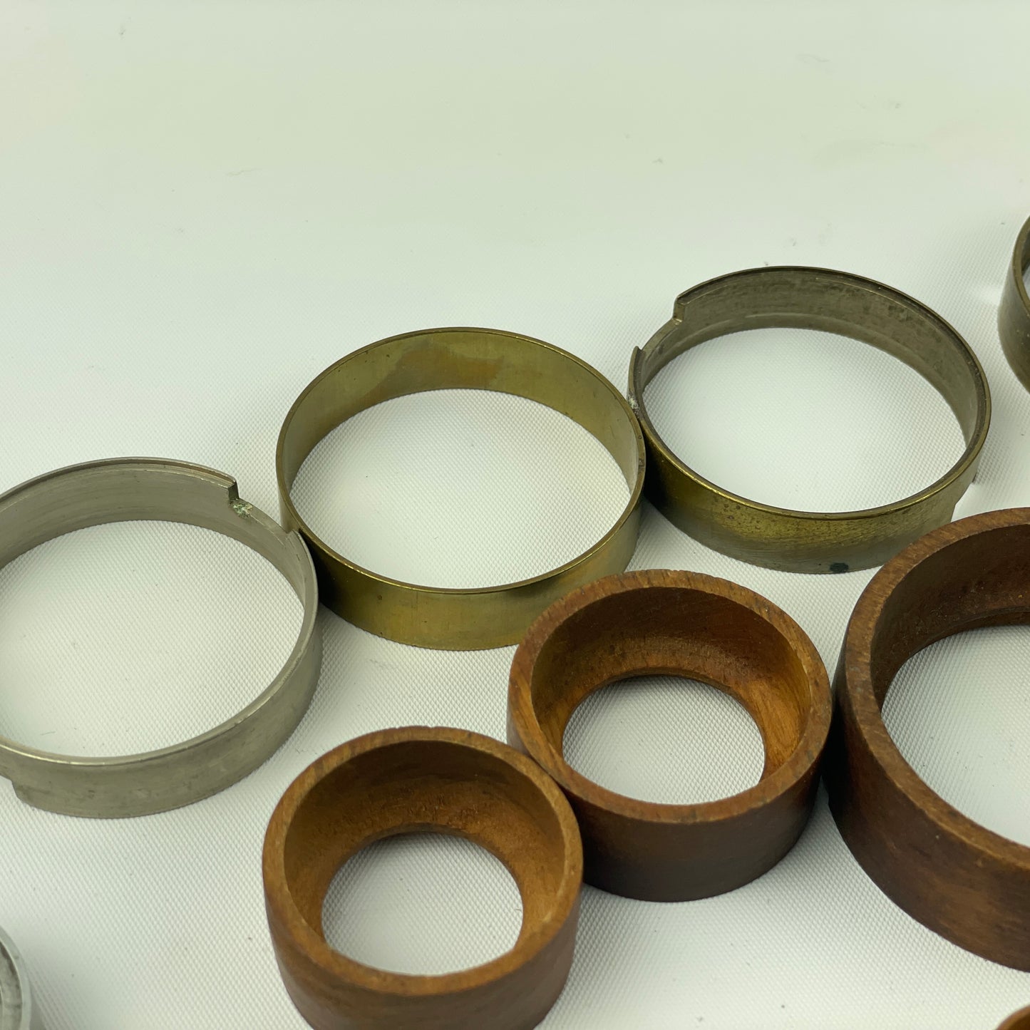 Apr Lot 38- Watchmaker’s Wood, Brass & Aluminum Lapel to Pocket Watch Movement Holders