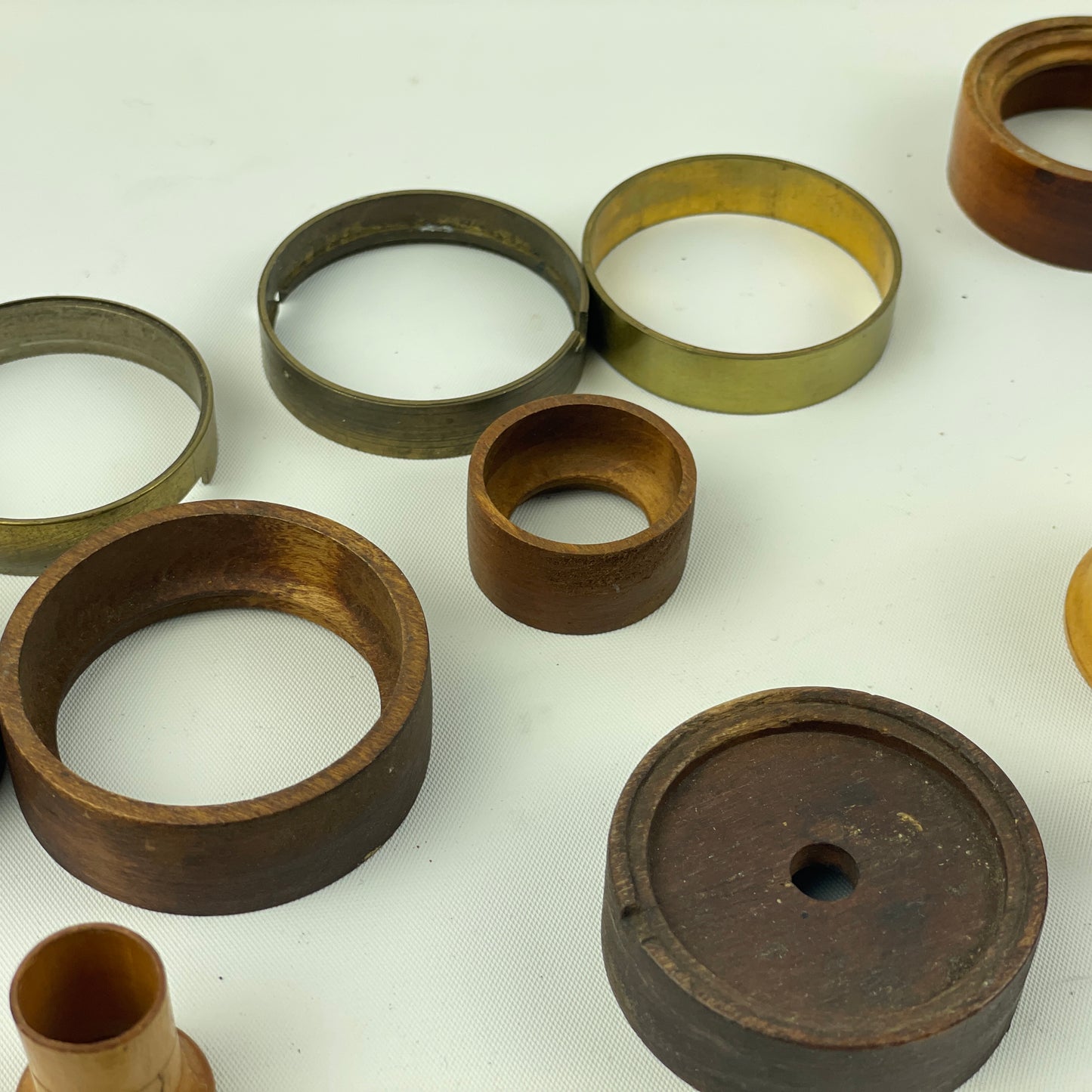 Apr Lot 38- Watchmaker’s Wood, Brass & Aluminum Lapel to Pocket Watch Movement Holders